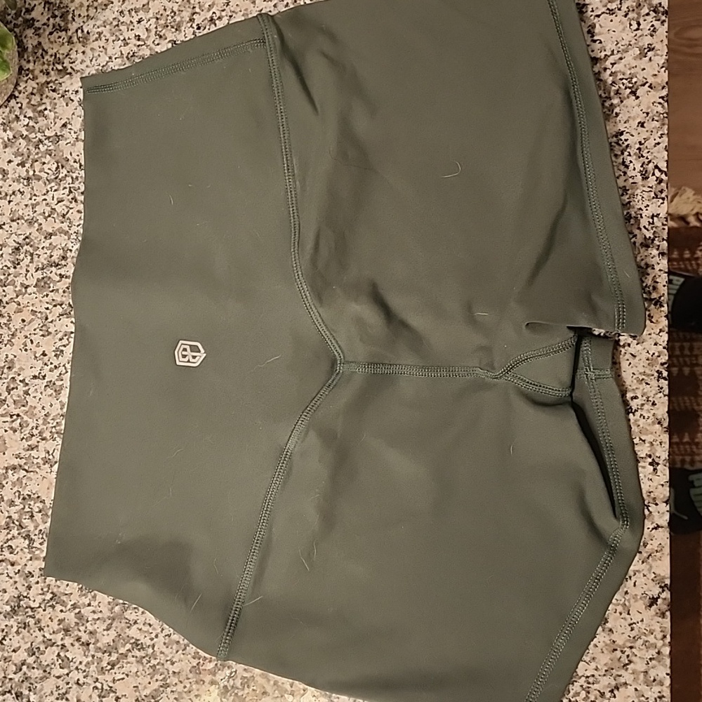 Green born primitive workout shorts.  Size medium.